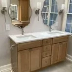 Oak double vanity with round mirrors