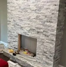 Stone wall complete, firebox opening framed